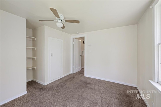 1324 E Oak St, Caldwell, ID 83605 - unfurnished bedroom with carpet flooring, ceiling fan, and baseboards
