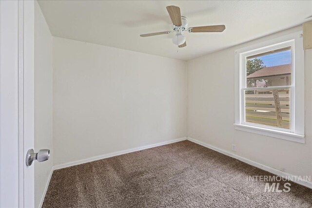 1324 E Oak St, Caldwell, ID 83605 - carpeted empty room featuring baseboards and ceiling fan