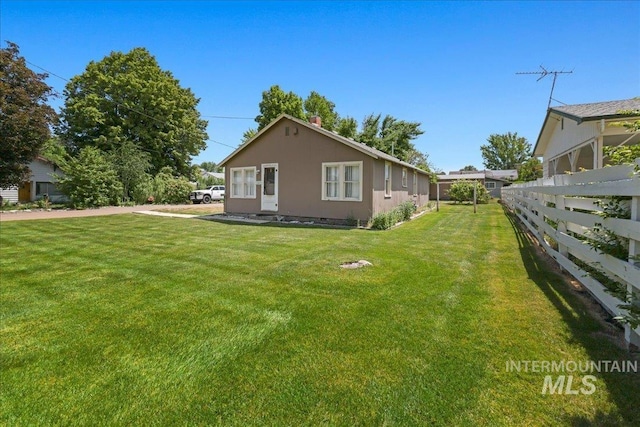 1324 E Oak St, Caldwell, ID 83605 - view of side of home with stucco siding