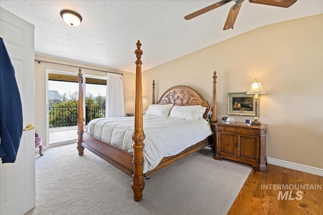 1640 S 5th W, Mountain Home, ID 83647 - bedroom featuring access to outside, baseboards, ceiling fan, and wood finished floors