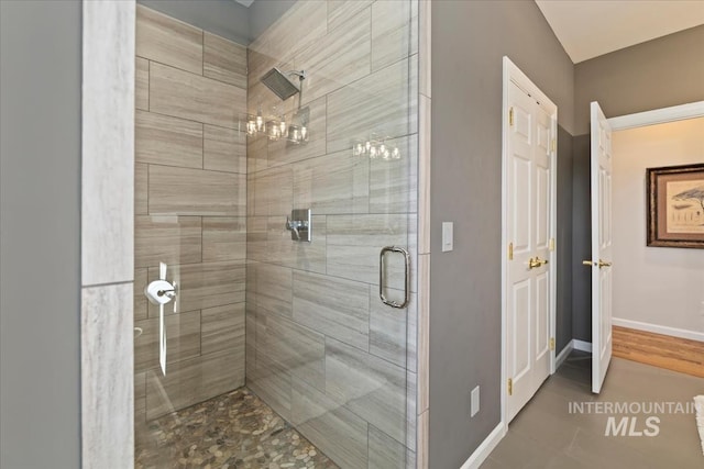 1640 S 5th W, Mountain Home, ID 83647 - bathroom featuring a shower stall and baseboards