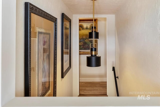 1640 S 5th W, Mountain Home, ID 83647 - hallway featuring wood finished floors
