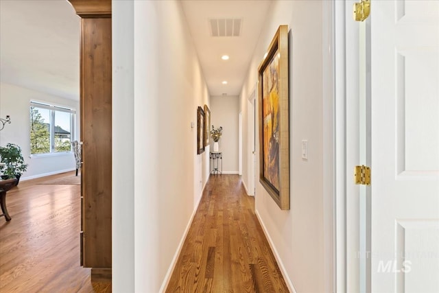 1640 S 5th W, Mountain Home, ID 83647 - corridor with wood finished floors, baseboards, and recessed lighting