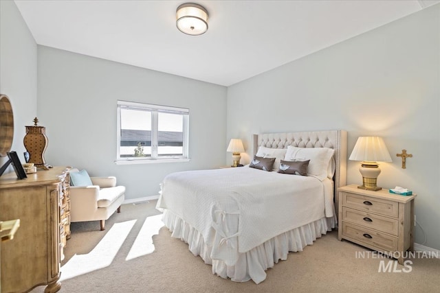 1640 S 5th W, Mountain Home, ID 83647 - bedroom featuring light colored carpet and baseboards