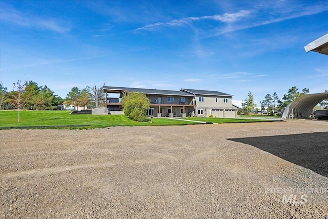 1640 S 5th W, Mountain Home, ID 83647 - view of front facade featuring a front lawn, driveway, and a carport