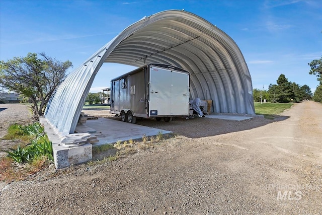 1640 S 5th W, Mountain Home, ID 83647 - view of vehicle parking featuring a detached carport and dirt driveway