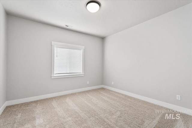 6811 W Los Flores Dr, Meridian, ID 83646 - carpeted empty room featuring baseboards and visible vents