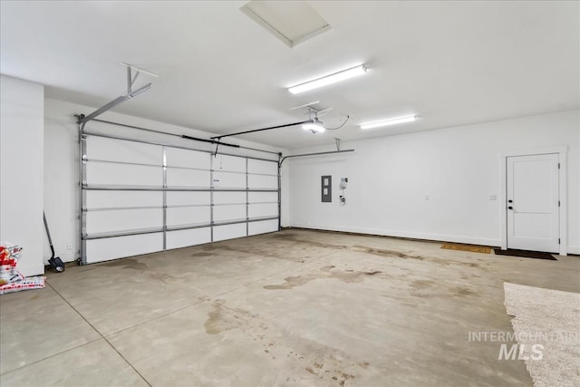 6811 W Los Flores Dr, Meridian, ID 83646 - garage with electric panel and a garage door opener