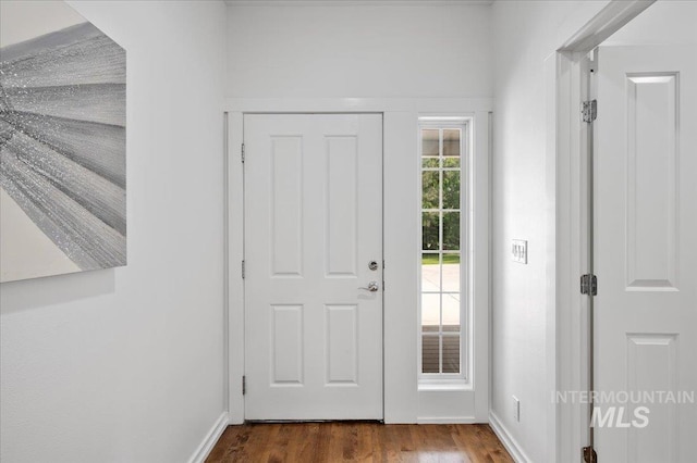 66 W Colchester Dr, Eagle, ID 83616 - entryway featuring dark wood-style flooring and baseboards