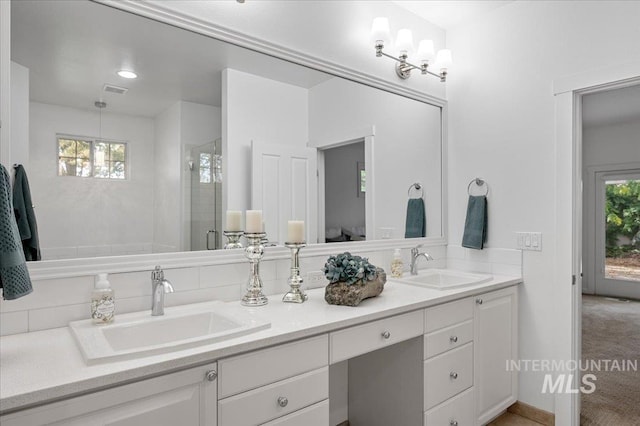 66 W Colchester Dr, Eagle, ID 83616 - full bathroom featuring ensuite bathroom, double vanity, and a shower with shower door