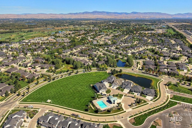 birds eye view of property featuring a residential view and a mountain view