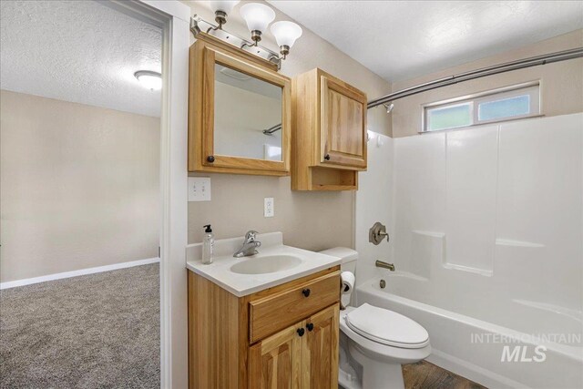 180 E Elmore, Richfield, ID 83349 - bathroom with vanity,  shower combination, and a textured ceiling