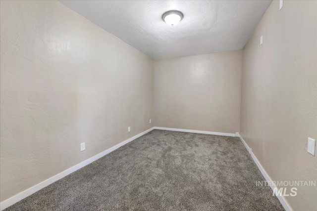 180 E Elmore, Richfield, ID 83349 - unfurnished room featuring carpet flooring and a textured ceiling