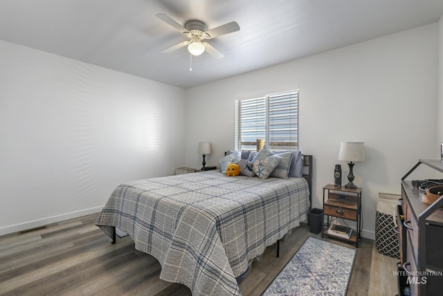 247 Washington St, Gooding, ID 83330 - bedroom with wood finished floors, baseboards, and ceiling fan