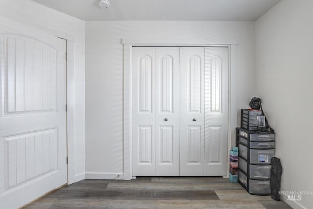 247 Washington St, Gooding, ID 83330 - unfurnished bedroom with wood finished floors and a closet