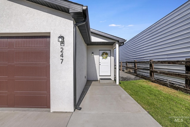247 Washington St, Gooding, ID 83330 - entrance to property with stucco siding and fence