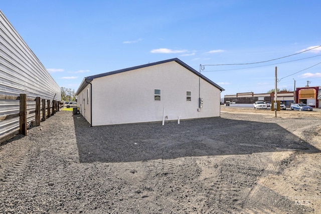 247 Washington St, Gooding, ID 83330 - view of side of property featuring stucco siding