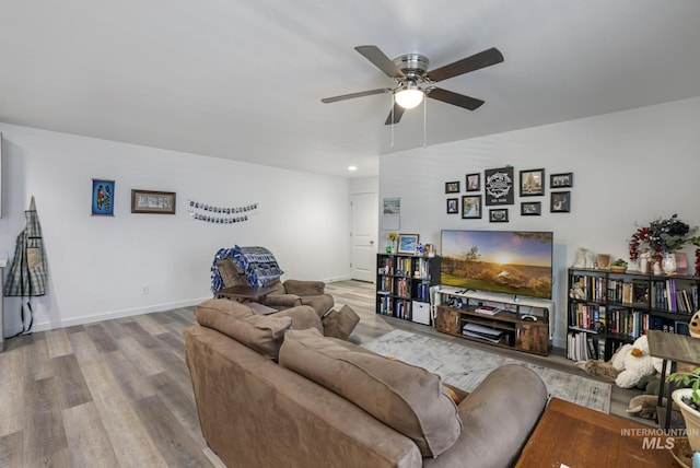 247 Washington St, Gooding, ID 83330 - living area with a ceiling fan, wood finished floors, baseboards, and recessed lighting