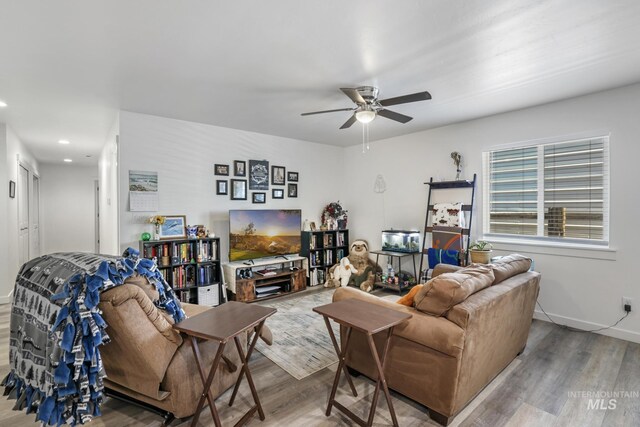 247 Washington St, Gooding, ID 83330 - living room with wood finished floors, ceiling fan, recessed lighting, and baseboards