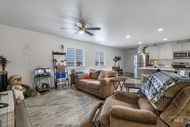 247 Washington St, Gooding, ID 83330 - living room featuring ceiling fan, recessed lighting, and light wood finished floors