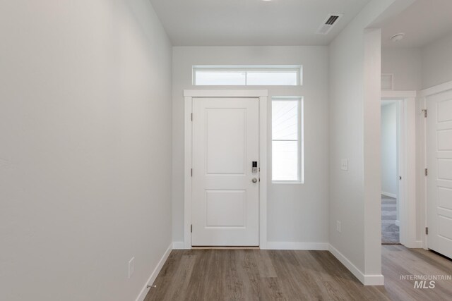 foyer featuring light hardwood / wood-style flooring