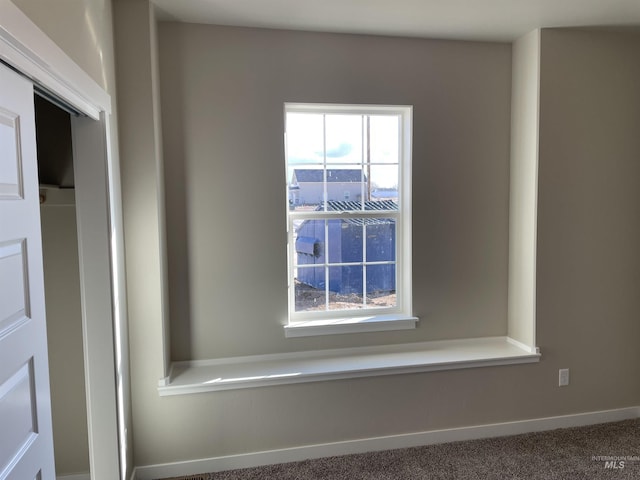 room details with carpet floors and baseboards