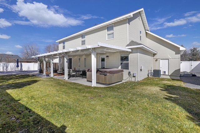 rear view of house featuring a hot tub, a patio, a fenced backyard, cooling unit, and a pergola