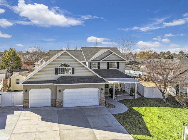 view of front of property featuring a shingled roof, stone siding, a gate, fence, and a front lawn