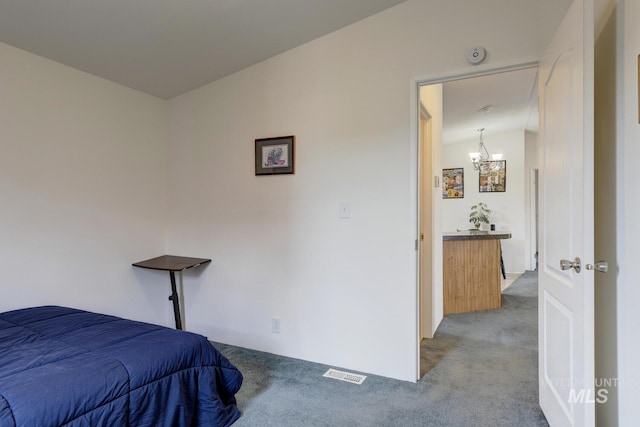 11755 E Cleft Rd, Mountain Home, ID 83647 - bedroom featuring carpet flooring and a chandelier