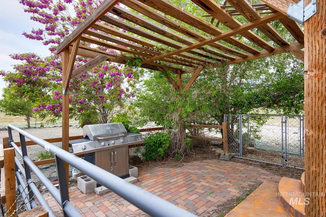 11755 E Cleft Rd, Mountain Home, ID 83647 - view of patio with a gate and a pergola