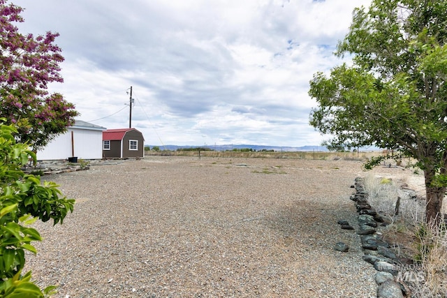 11755 E Cleft Rd, Mountain Home, ID 83647 - view of yard with an outdoor structure