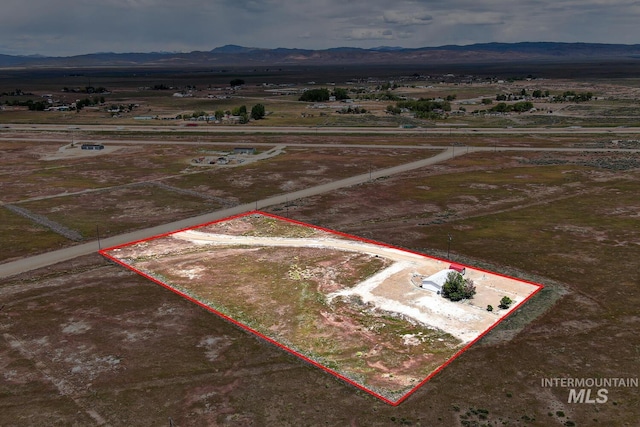 11755 E Cleft Rd, Mountain Home, ID 83647 - view of rural area with a mountain backdrop and property parcel outlined