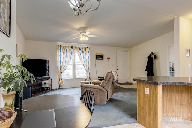 11755 E Cleft Rd, Mountain Home, ID 83647 - living room with light carpet, ceiling fan, and a chandelier