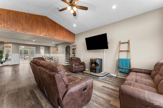 living area featuring stairs, recessed lighting, wood finished floors, high vaulted ceiling, and a ceiling fan