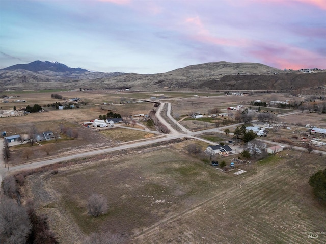 bird's eye view with a mountain view and a rural view