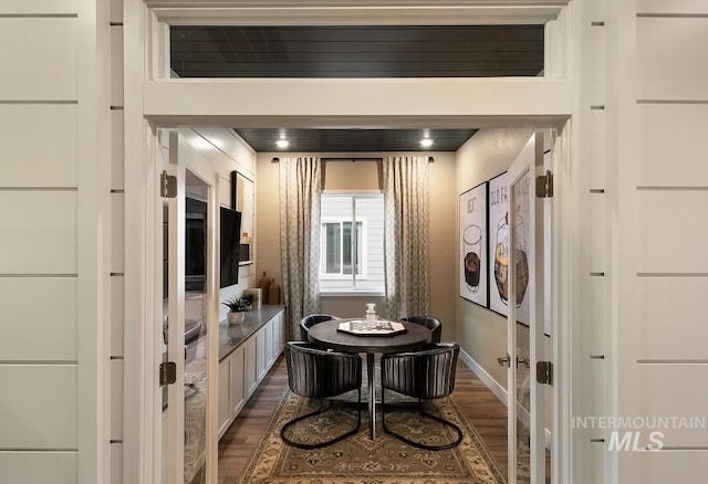 11801 W Reining Horse Ln, Kuna, ID 83634 - dining space with dark wood-style floors and baseboards