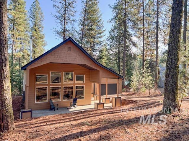 back of property with a patio area