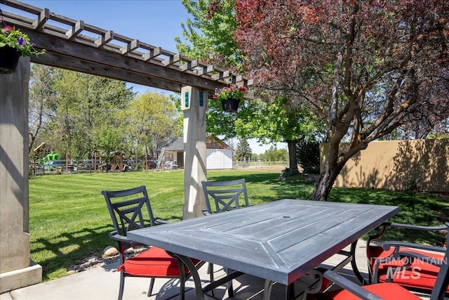 101 Minot St, Middleton, ID 83644 - view of patio / terrace featuring outdoor dining space, an outbuilding, and a pergola