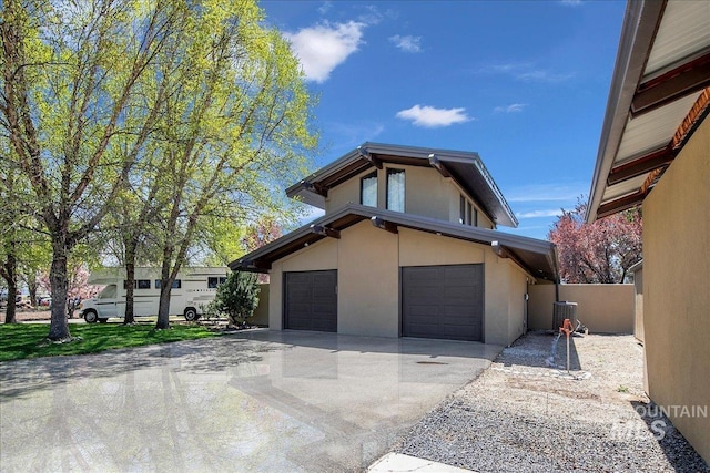101 Minot St, Middleton, ID 83644 - view of front of house with stucco siding and concrete driveway