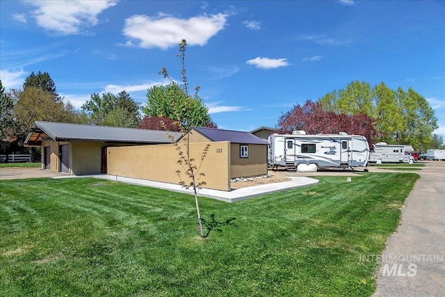 101 Minot St, Middleton, ID 83644 - single story home with a metal roof and a front lawn