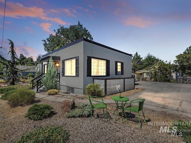 view of front of home featuring stucco siding