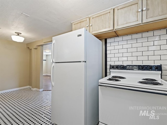 kitchen featuring light brown cabinets, backsplash, a textured ceiling, white appliances, and baseboards