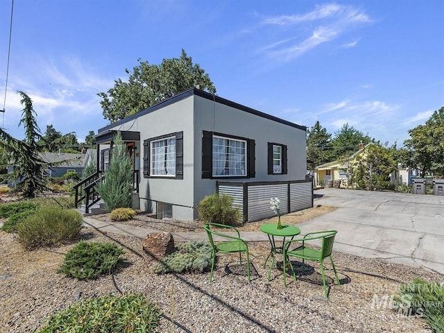 view of front of home featuring stucco siding