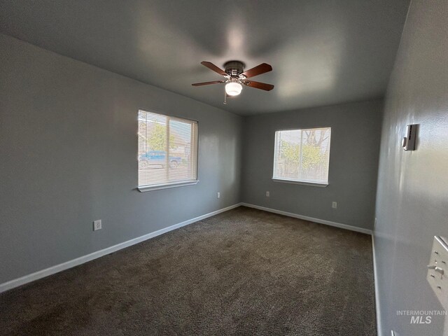 unfurnished room with ceiling fan, plenty of natural light, and carpet