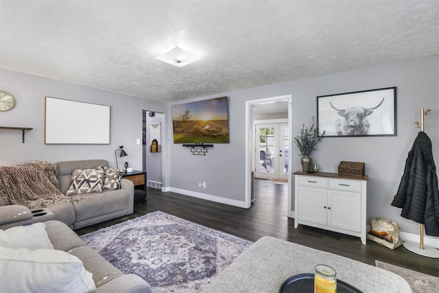 168 W Heyburn Ave, Twin Falls, ID 83301 - living room with dark wood-type flooring and a textured ceiling