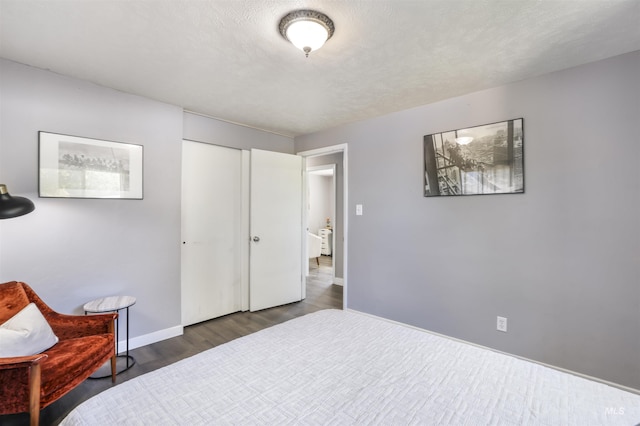 168 W Heyburn Ave, Twin Falls, ID 83301 - bedroom featuring wood finished floors and baseboards