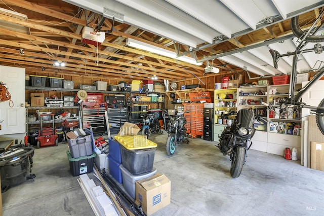 168 W Heyburn Ave, Twin Falls, ID 83301 - garage with a workshop area and a garage door opener
