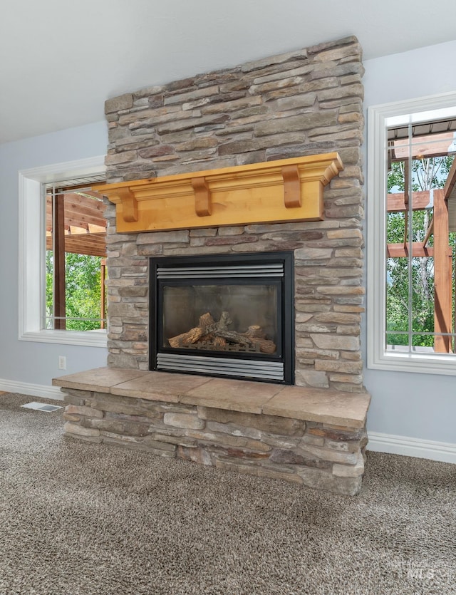 200 W Commons Rd, Idaho Falls, ID 83401 - detailed view of a stone fireplace and carpet flooring