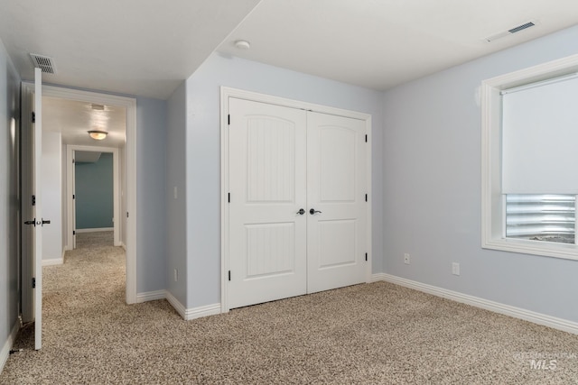 200 W Commons Rd, Idaho Falls, ID 83401 - unfurnished bedroom with carpet flooring and a closet