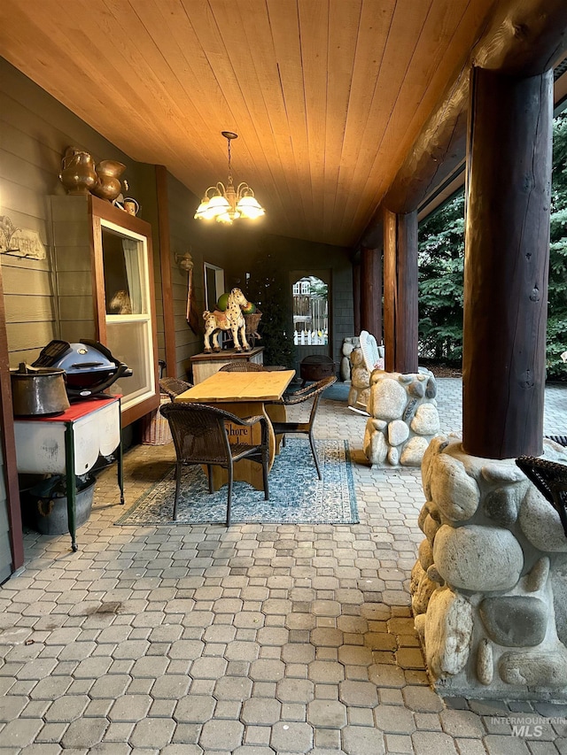 76 Rogers Ln, Mccall, ID 83638 - dining space featuring wood ceiling and a chandelier